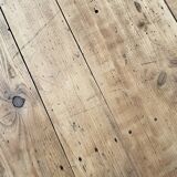 Solid wood workshop table with straight legs.