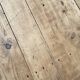 Solid wood workshop table with straight legs.