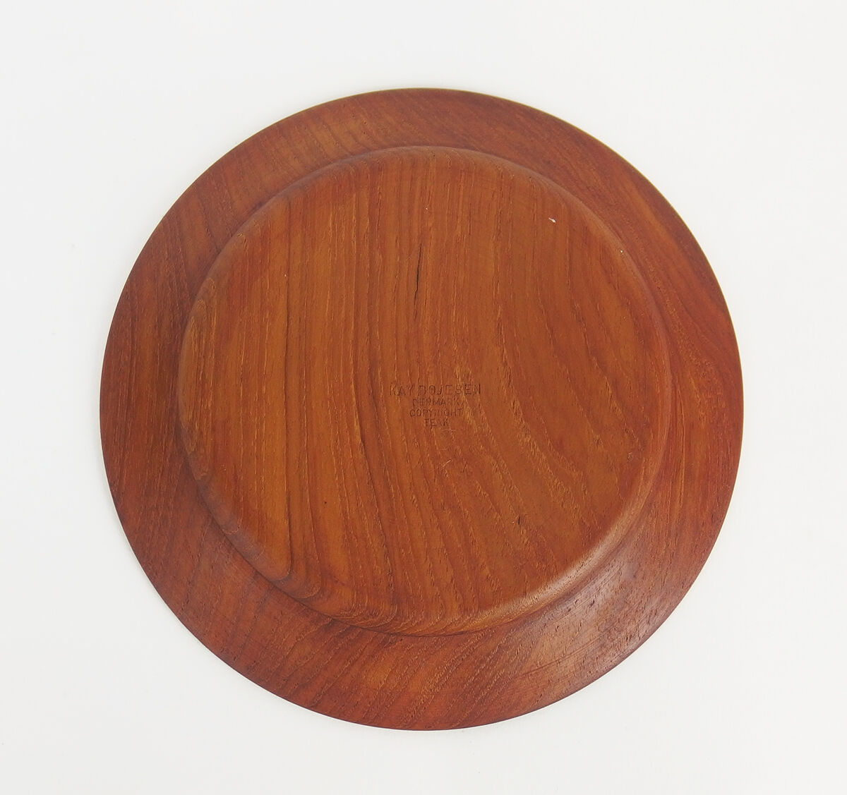 Six Danish teak dessert plates including three marked Kay Bojesen