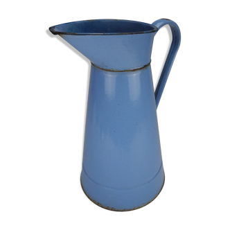 Old vintage enameled sheet metal jug