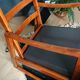 Rocking-chair in teak and skai