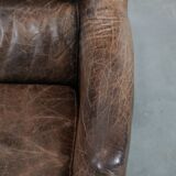 Very comfortable vintage cow leather armchair with character