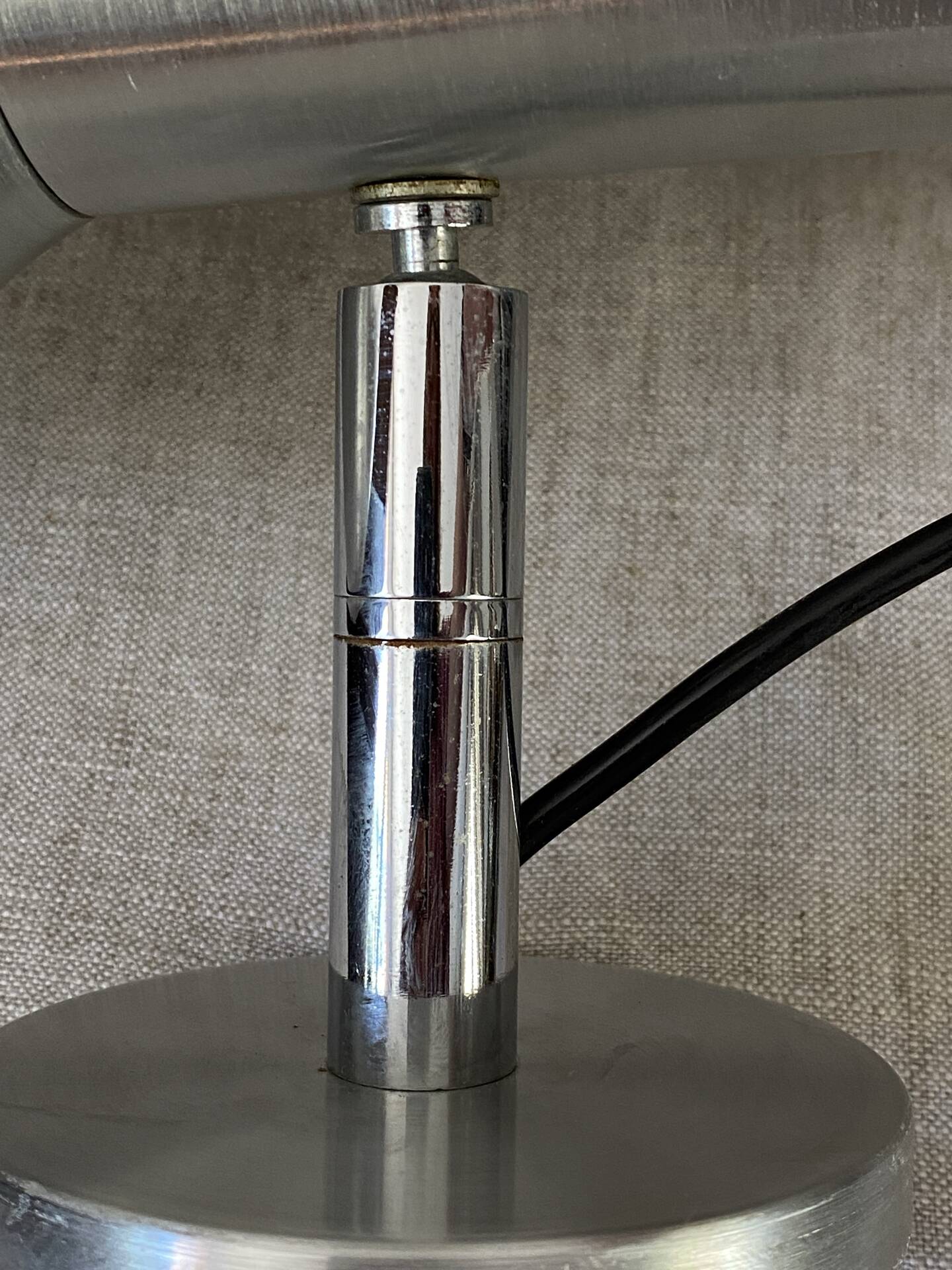 Pair of brushed metal wall sconces