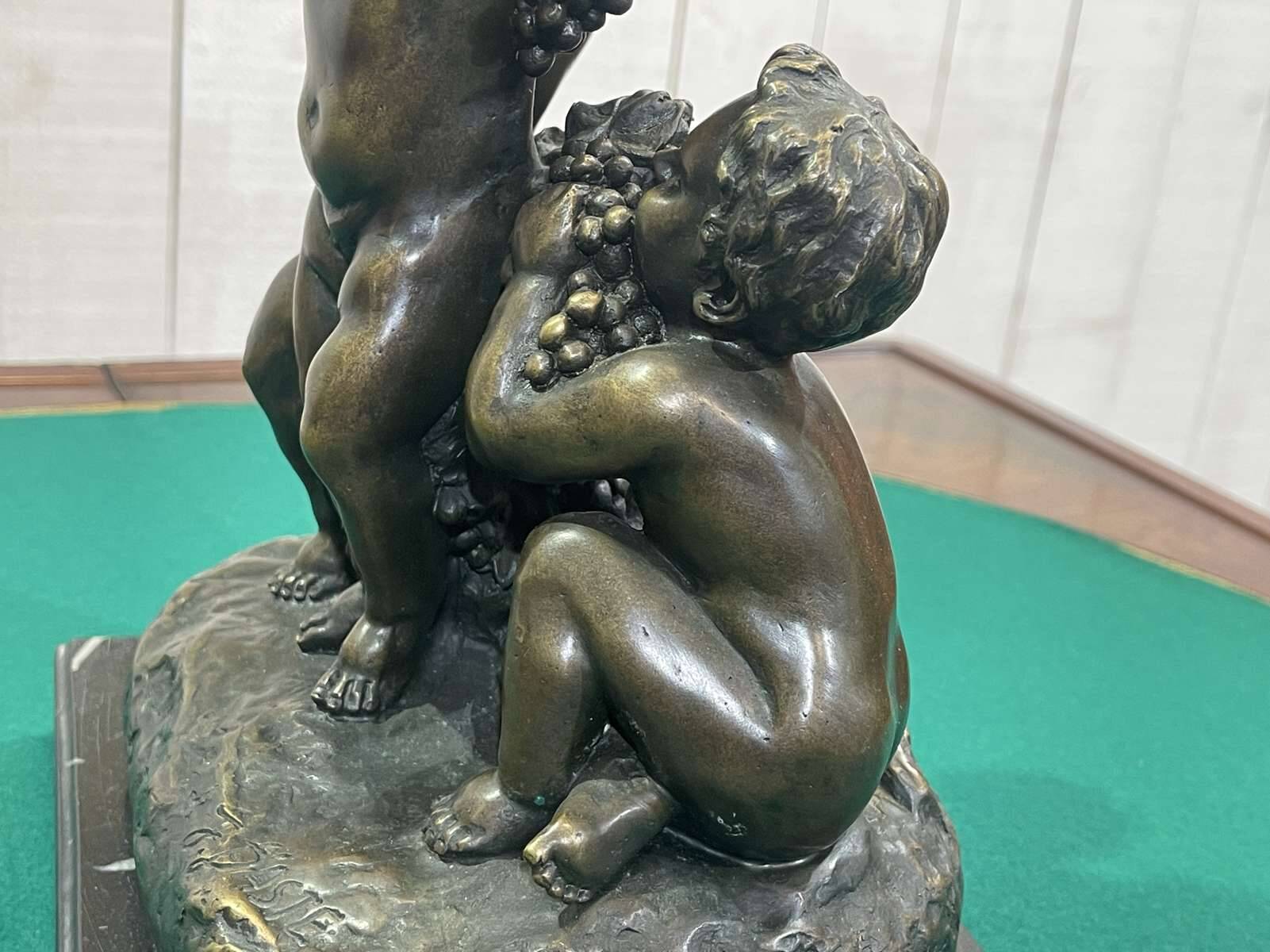 Bronze piece depicting 3 cherubs signed J. DASTE - 1950s
