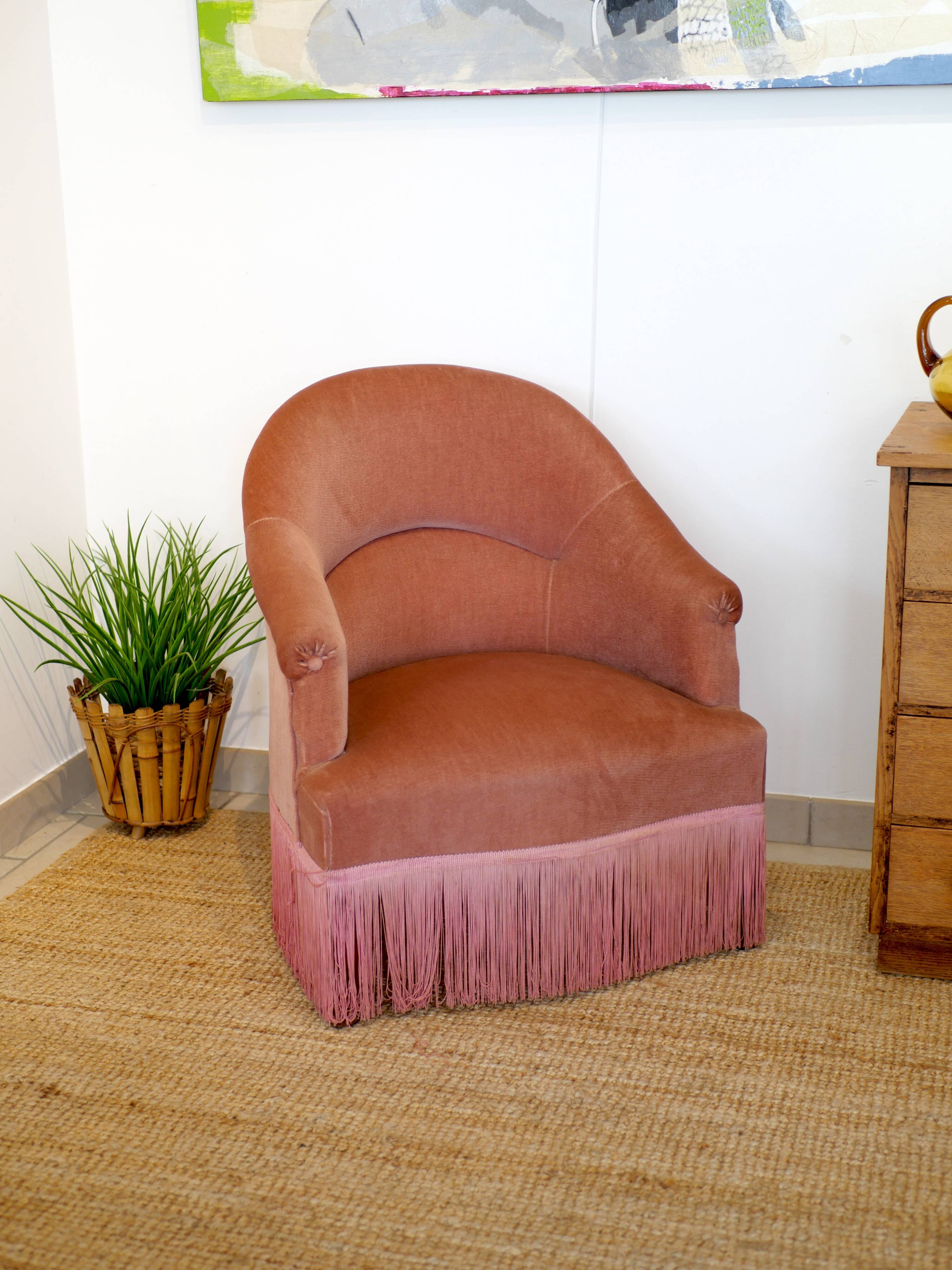 Pink velvet armchair