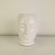 Vintage anthropomorphic ceramic head vase.