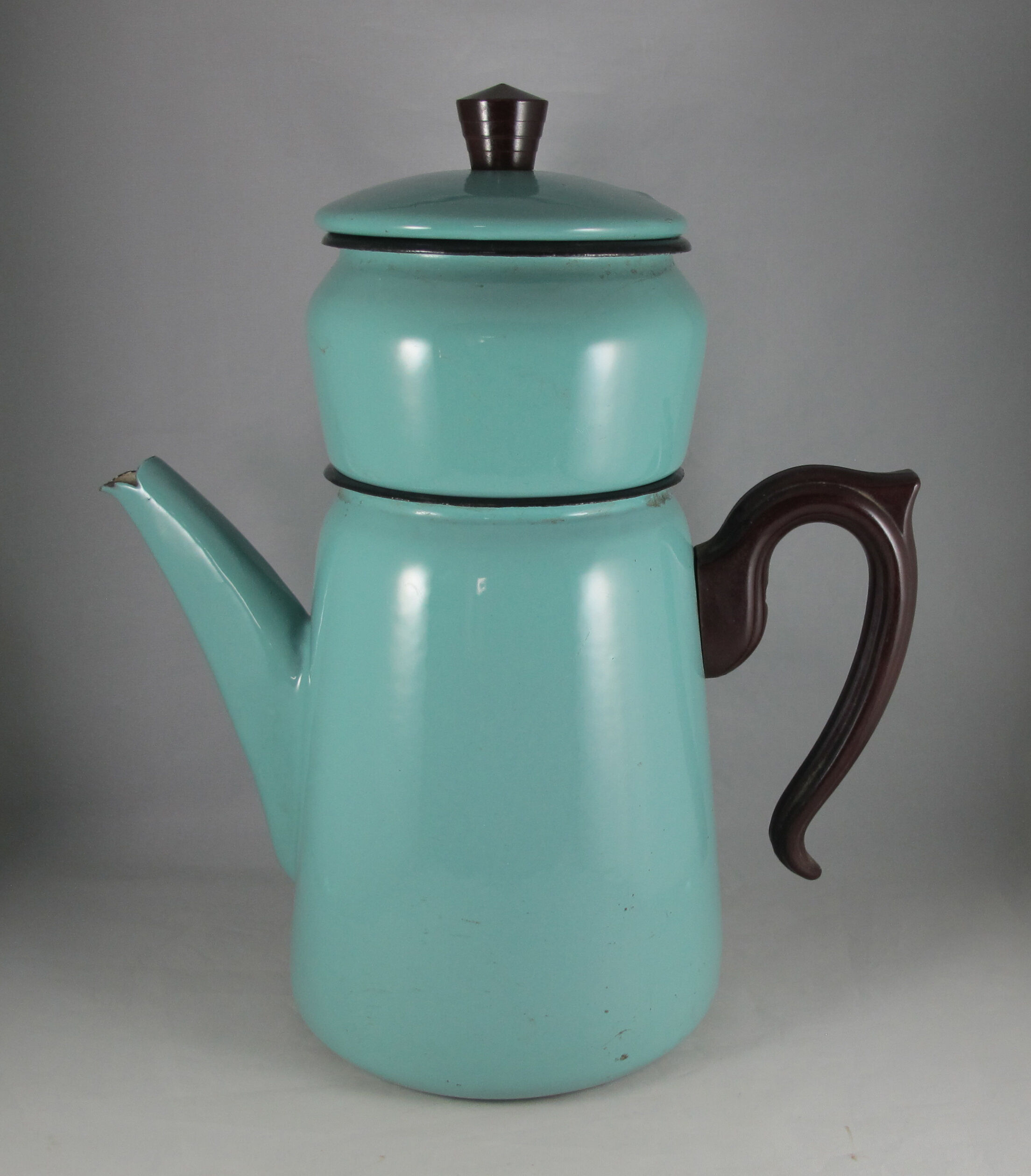 large vintage coffee maker made of enamelled sheet metal