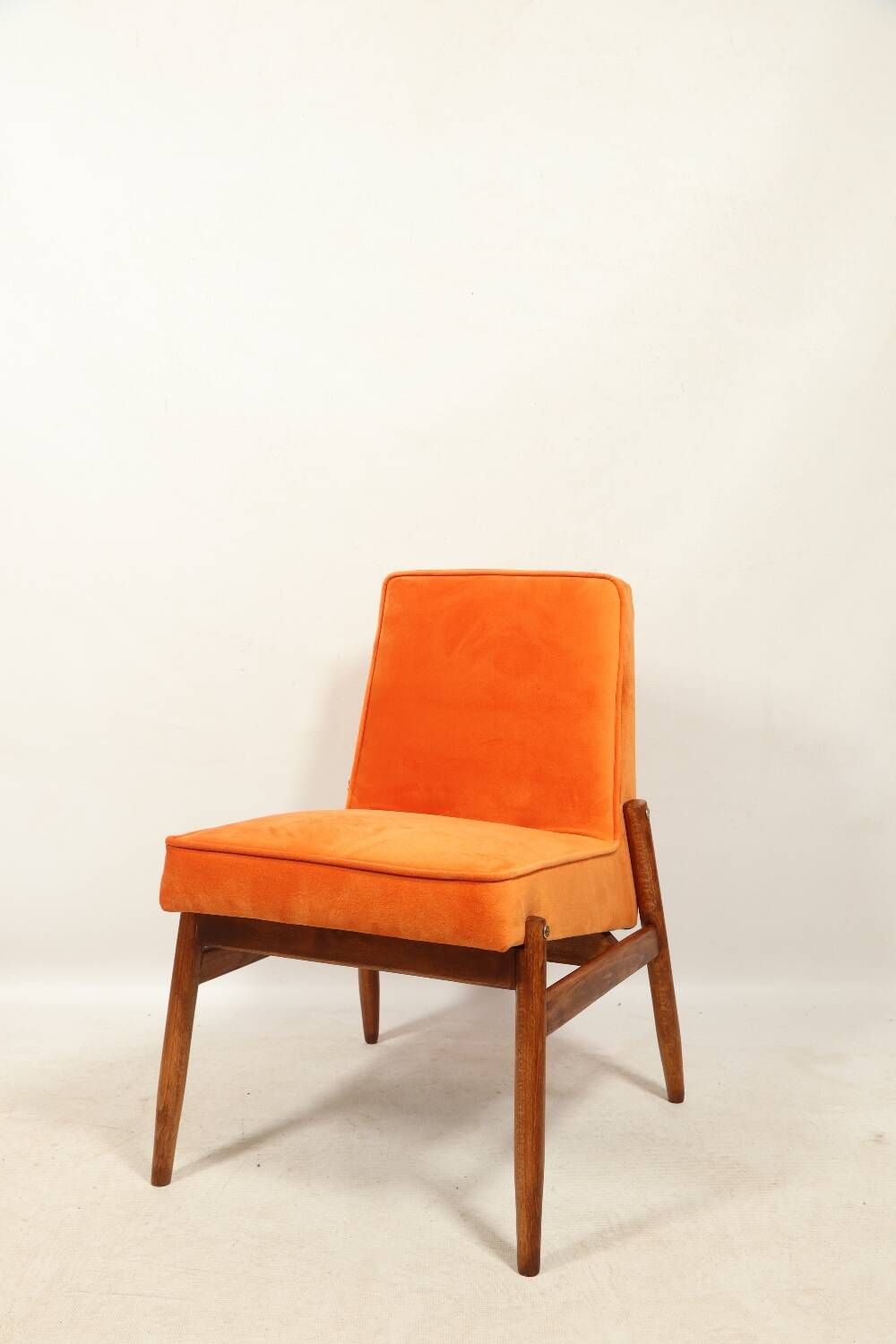 Papaya orange velvet mid century modern 1970s renovated armchair