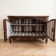 Antique storage furniture in walnut and walnut burl.