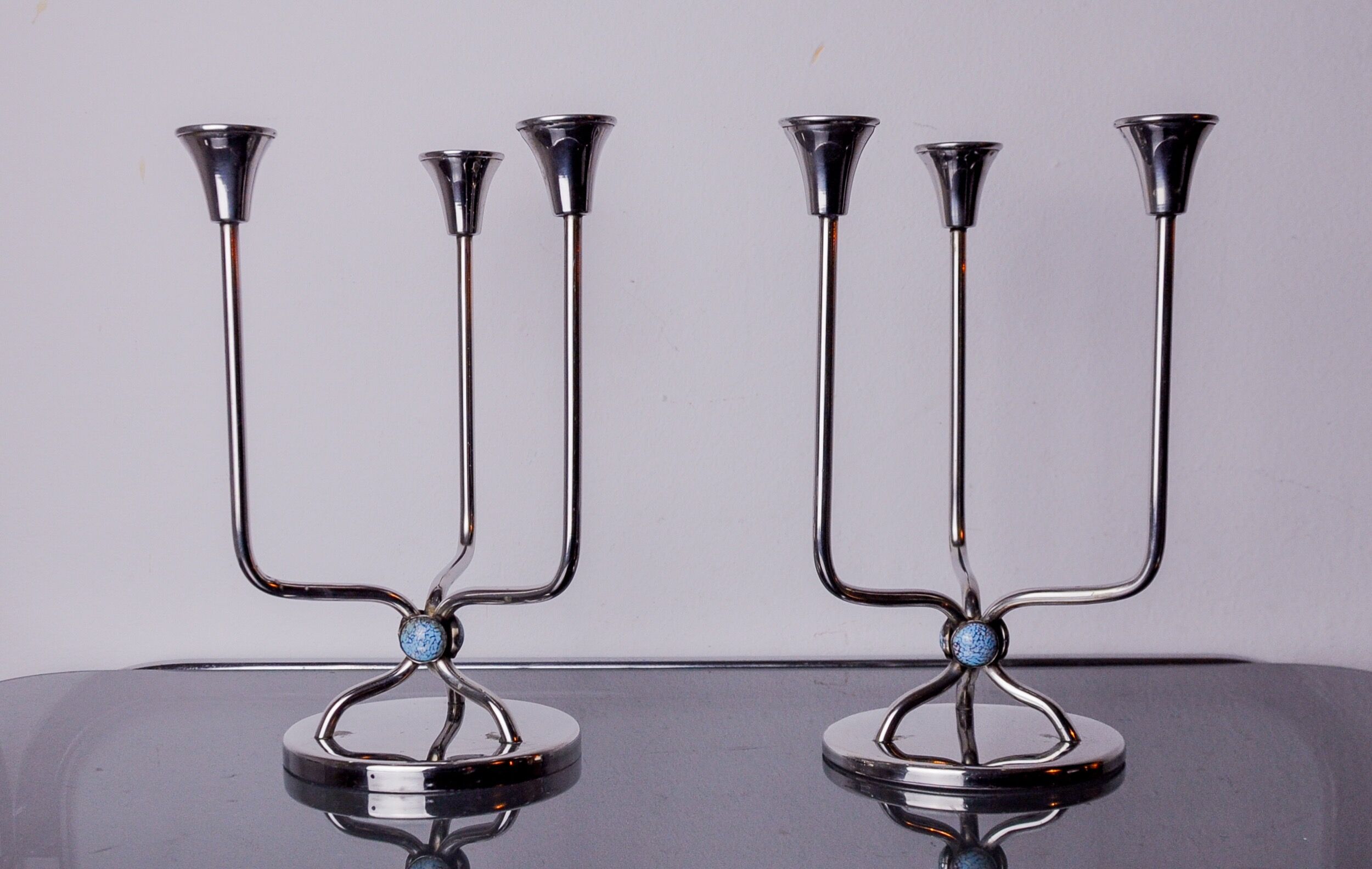 Pair of art deco candlesticks in stainless steel 3 flames and blue stones, Spain, 1970