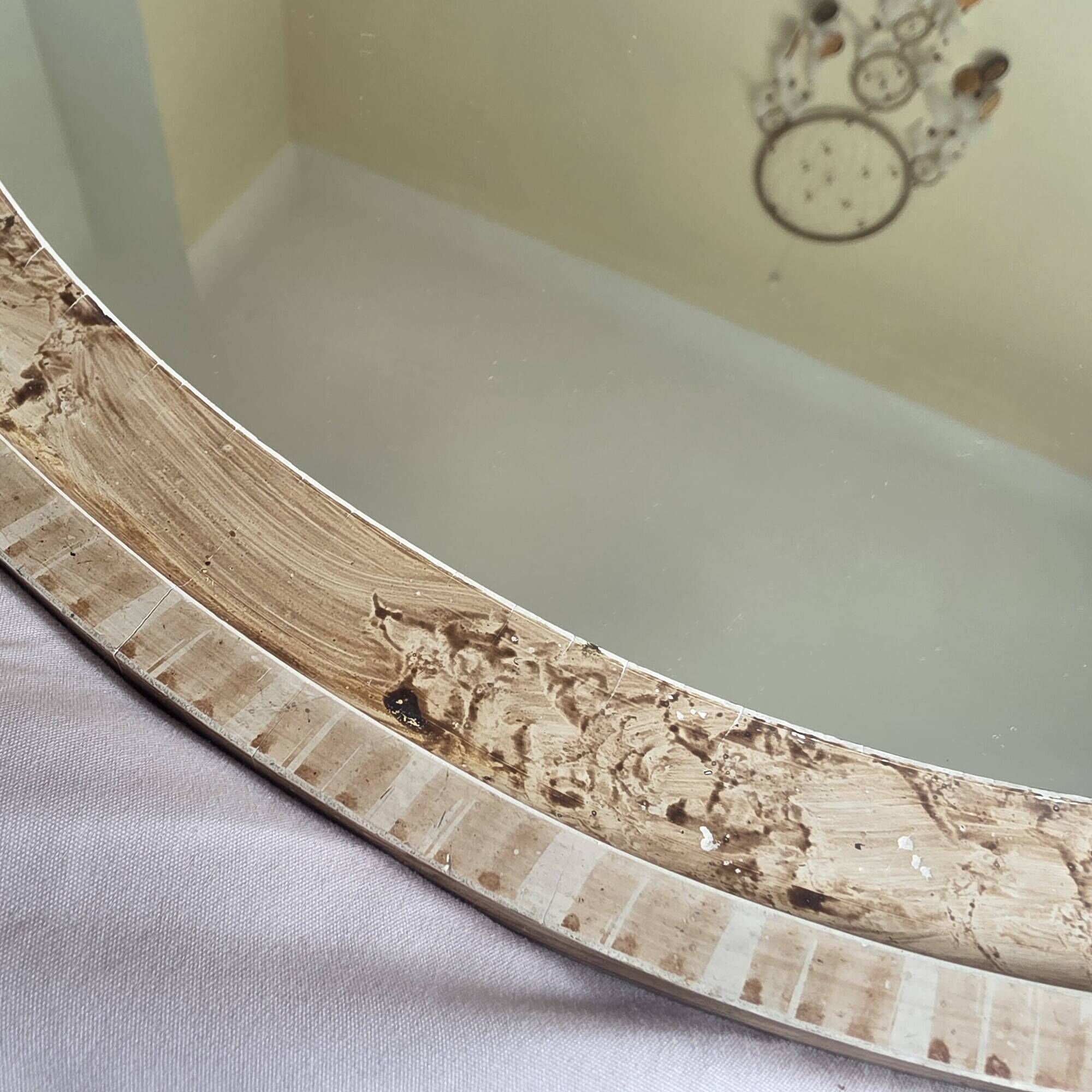 paire de miroirs ovales anciens
