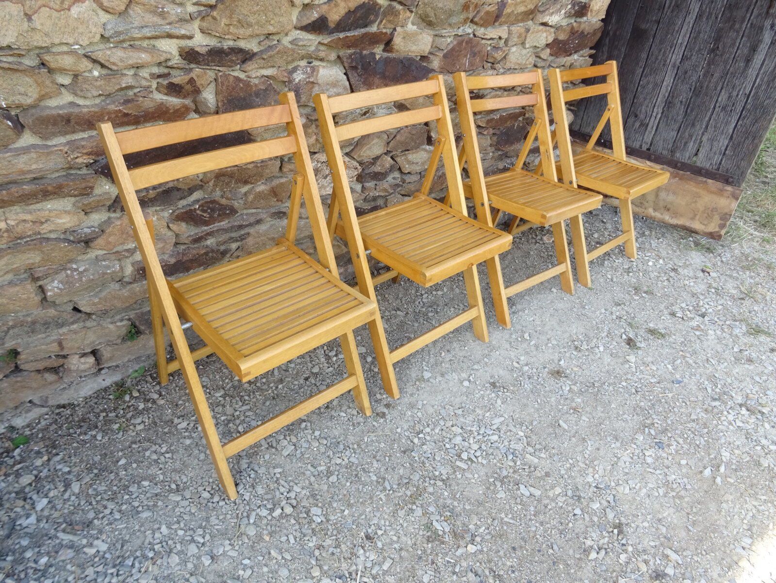 Series of 4 folding chairs in solid beech