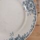 Round serving dish in iron earth