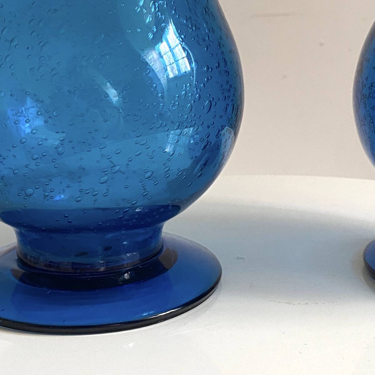 Pair of candle holders from the Biot glassworks, height 22 cm, diameter 15 cm.