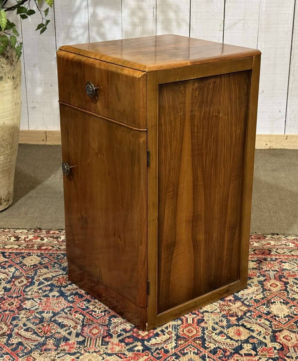 English Art Deco bedside table from the 1950s in walnut.