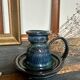 Enameled stoneware candle holder