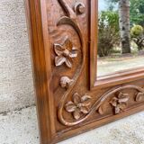 Two antique 19th century mirrors in carved Napoleon oak wood