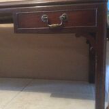 Coffee table in mahogany and leather