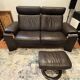 2-seater Stressless sofa with its footrest.