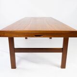 Coffee table in teak with extension plate of Danish design from the 1960s. The table is in great vin