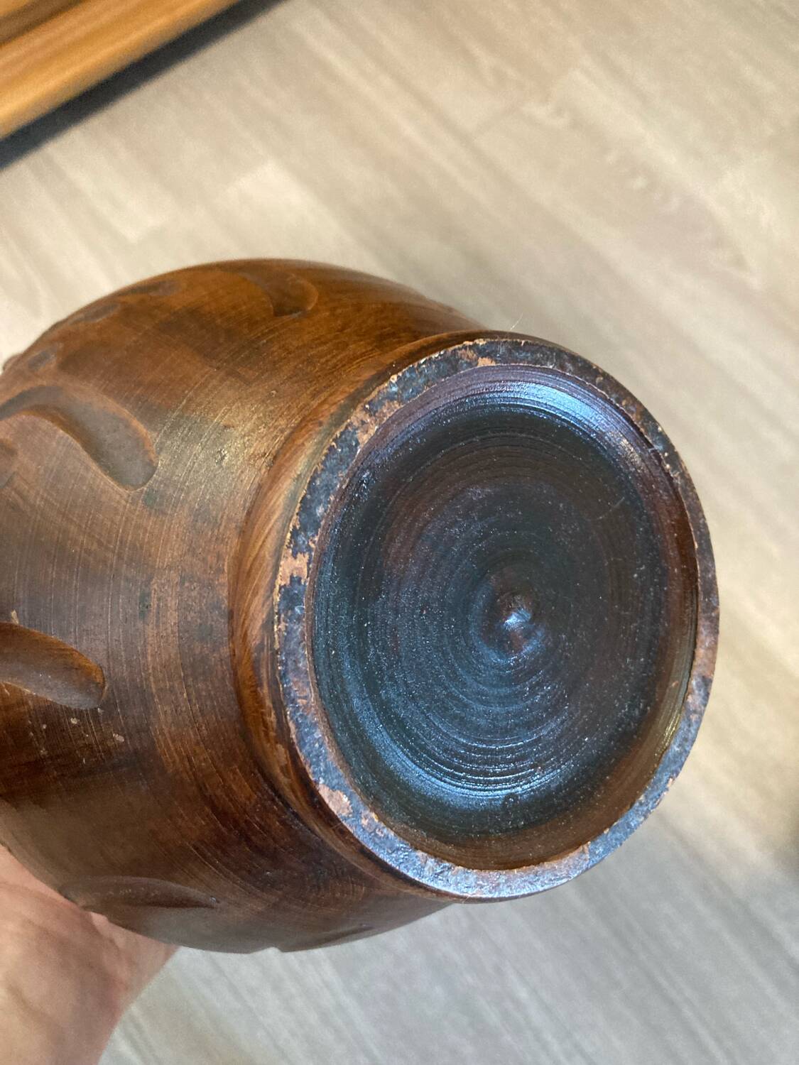 Scarified ceramic vase with twisted handle - African style