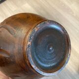 Scarified ceramic vase with twisted handle - African style