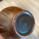 Scarified ceramic vase with twisted handle - African style