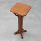 Art Deco oak pedestal with pierced brackets and cross base, Belgium 1920s