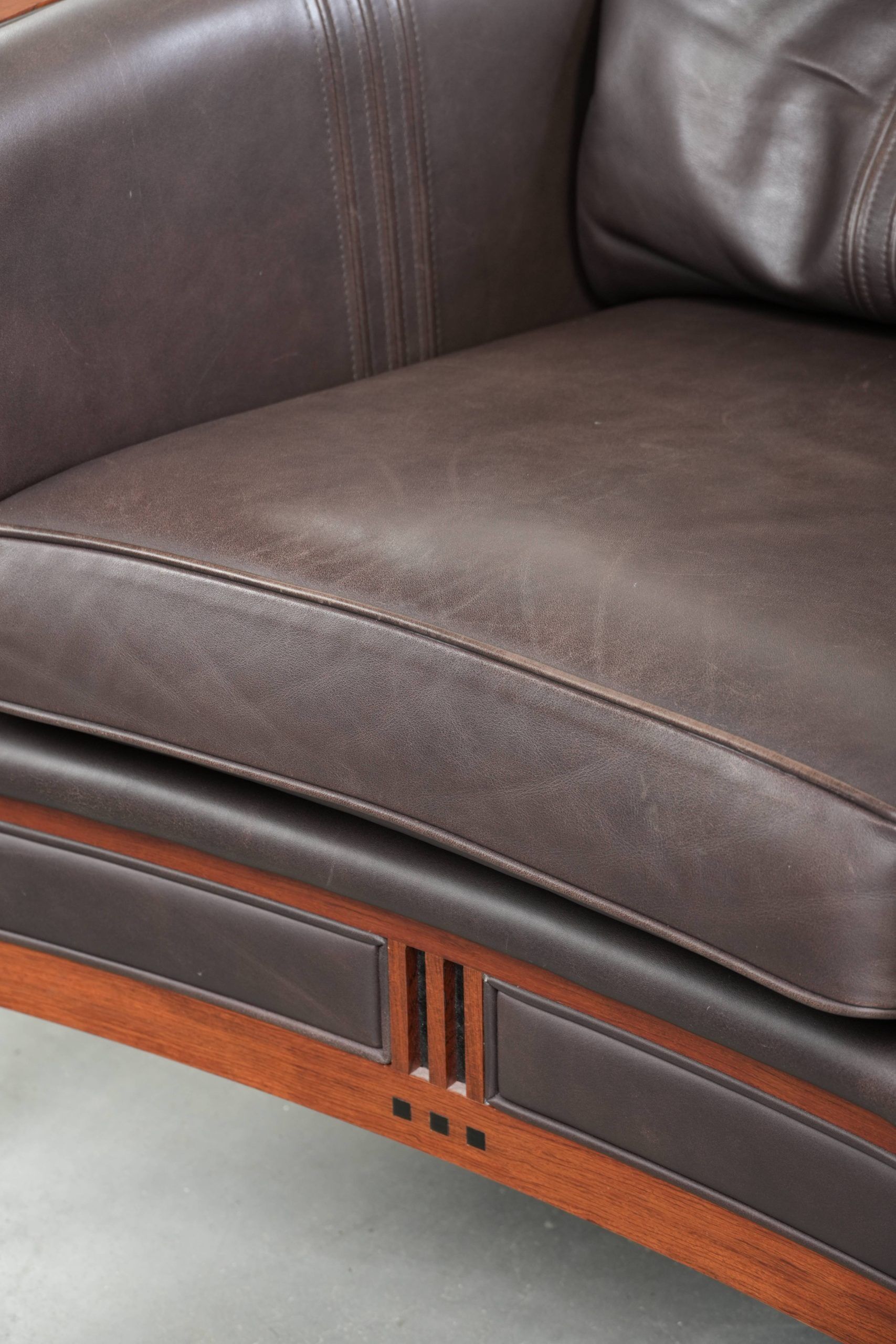 Art Deco design set consisting of an armchair and ottoman