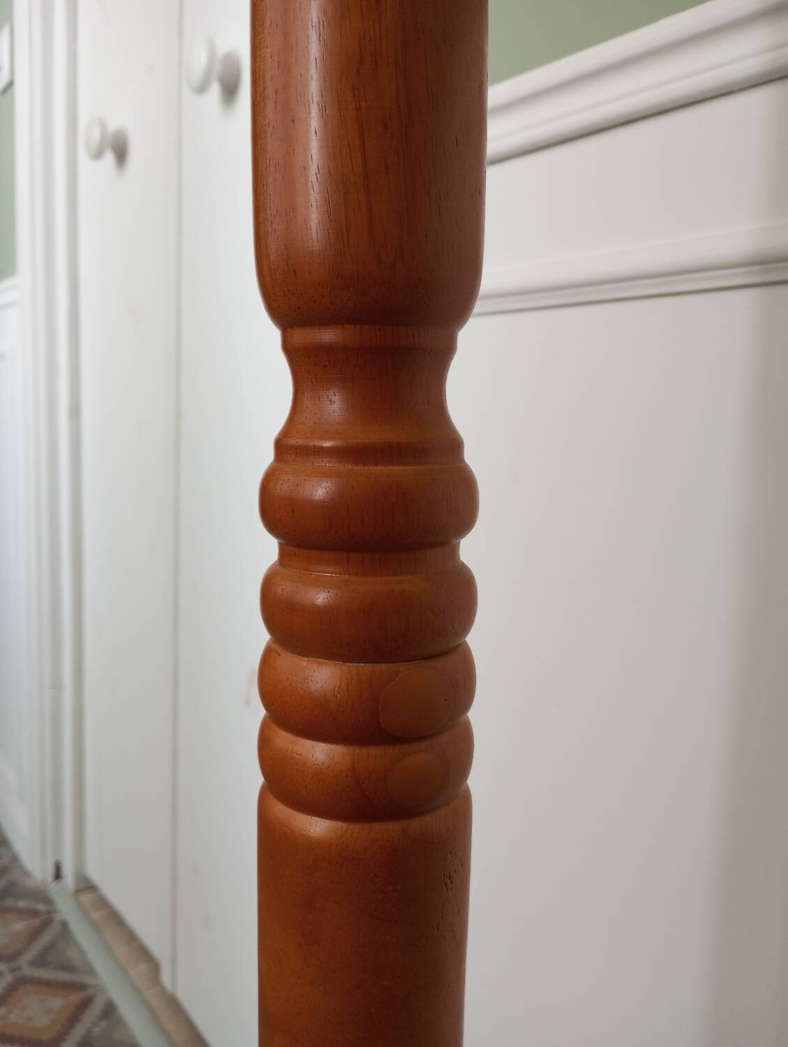 Wooden coat rack on stand