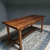 Old pine dining table with drawers