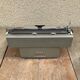 Machine à ecrire Olivetti Lexikon 80 métal gris avec housse vintage