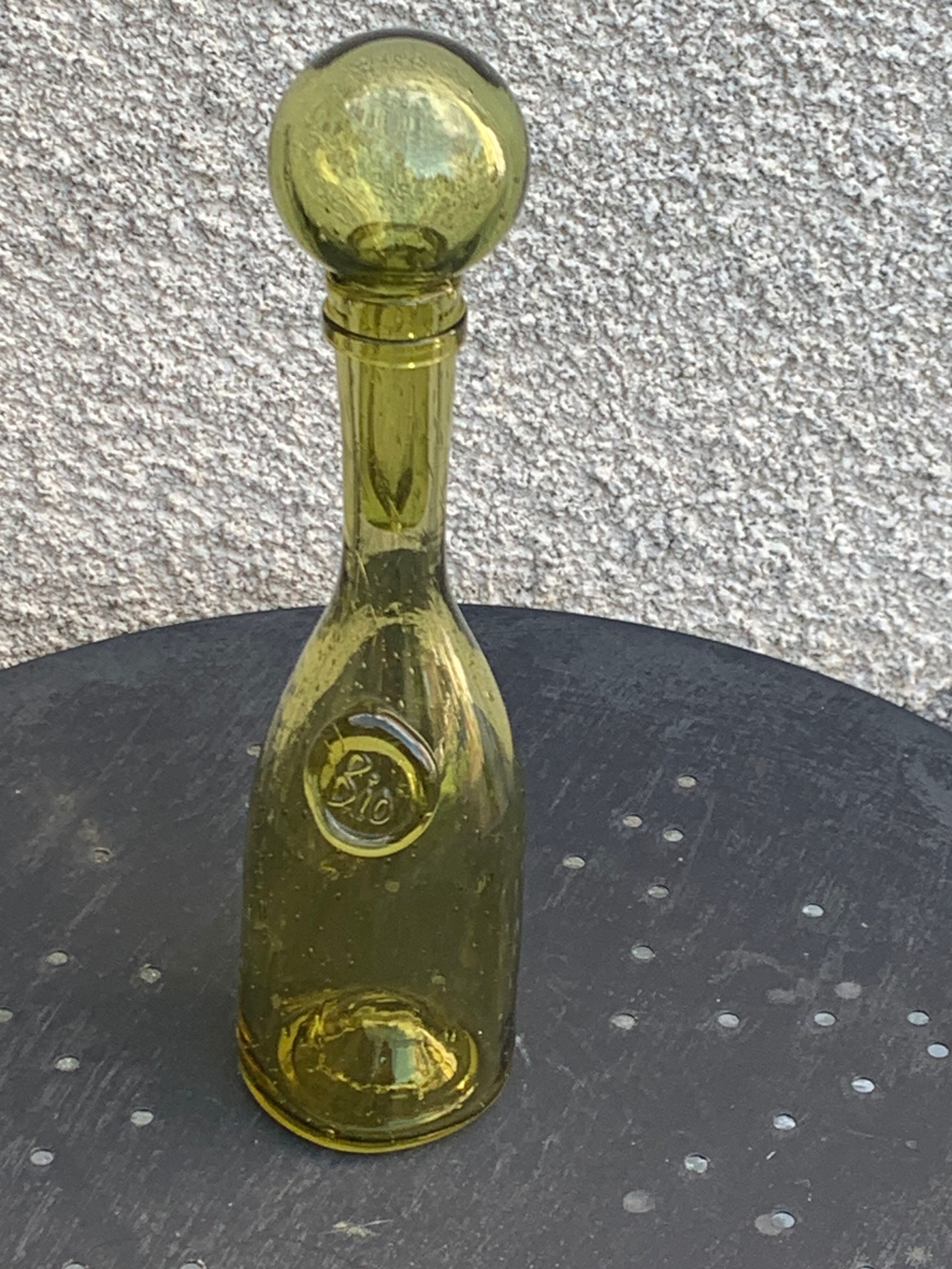 Glassblown glass decanter from the Biot collector glassworks