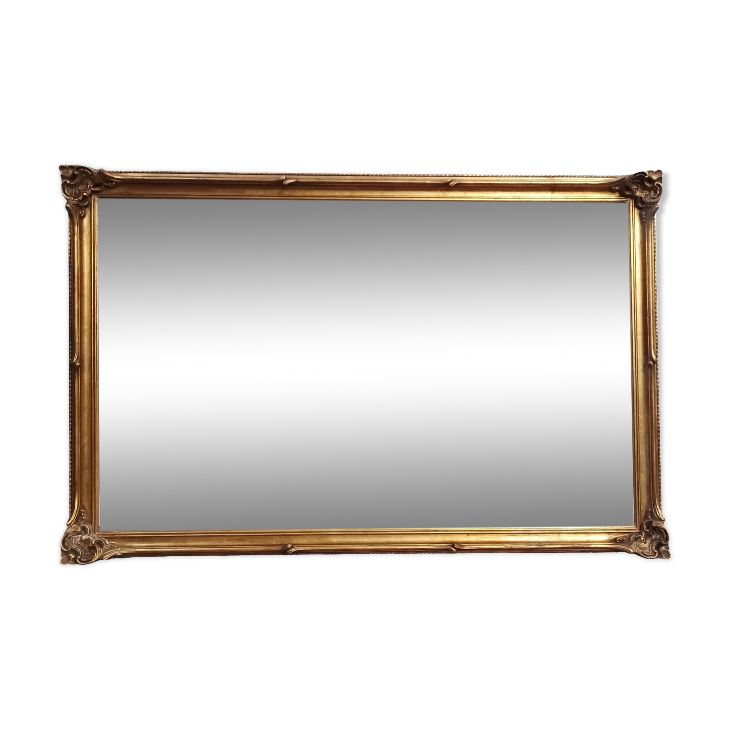 Old frame in wood and gilded stucco