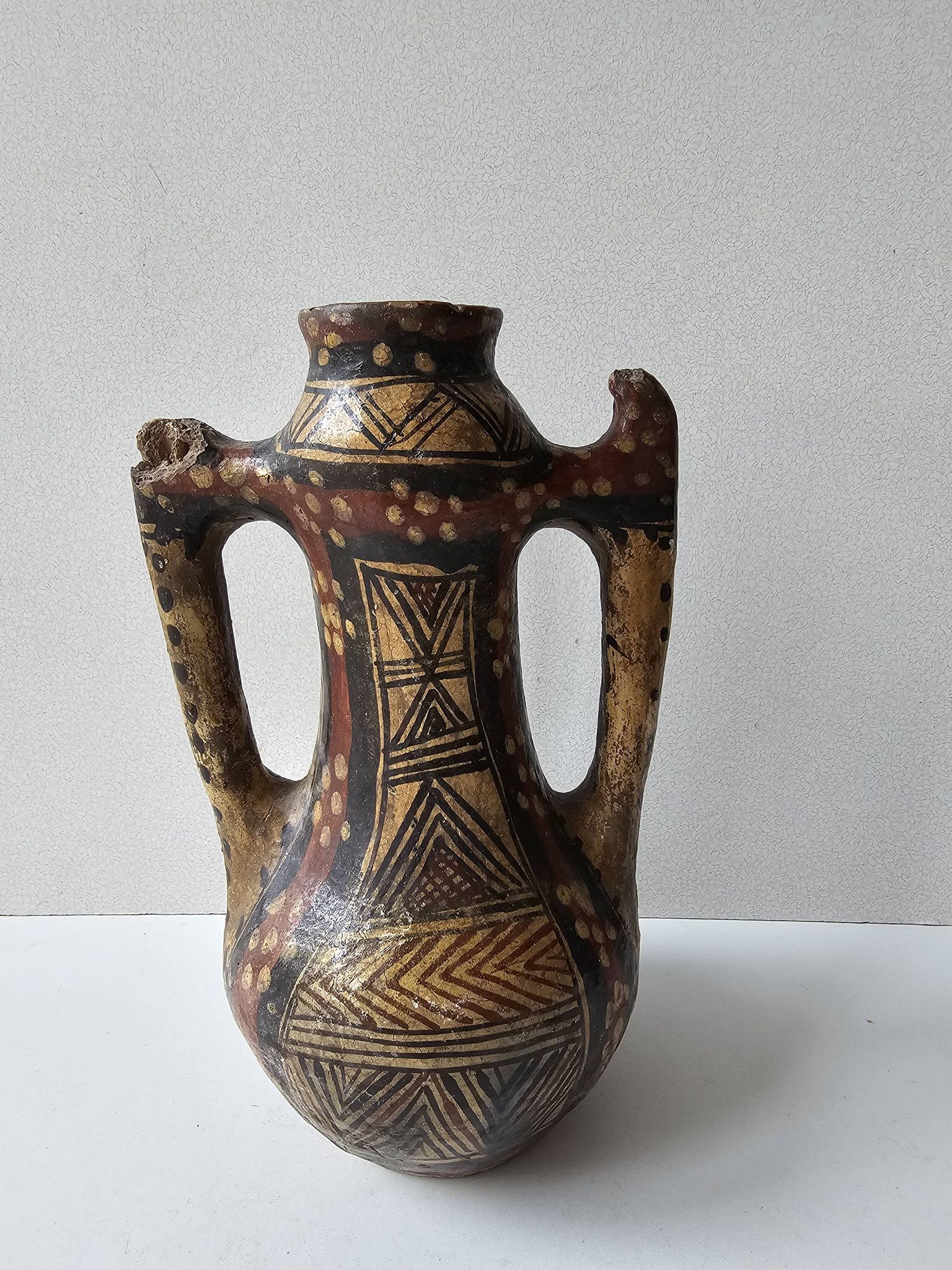 Kabyle Algerian pottery oil jar with polychrome geometric decorations
