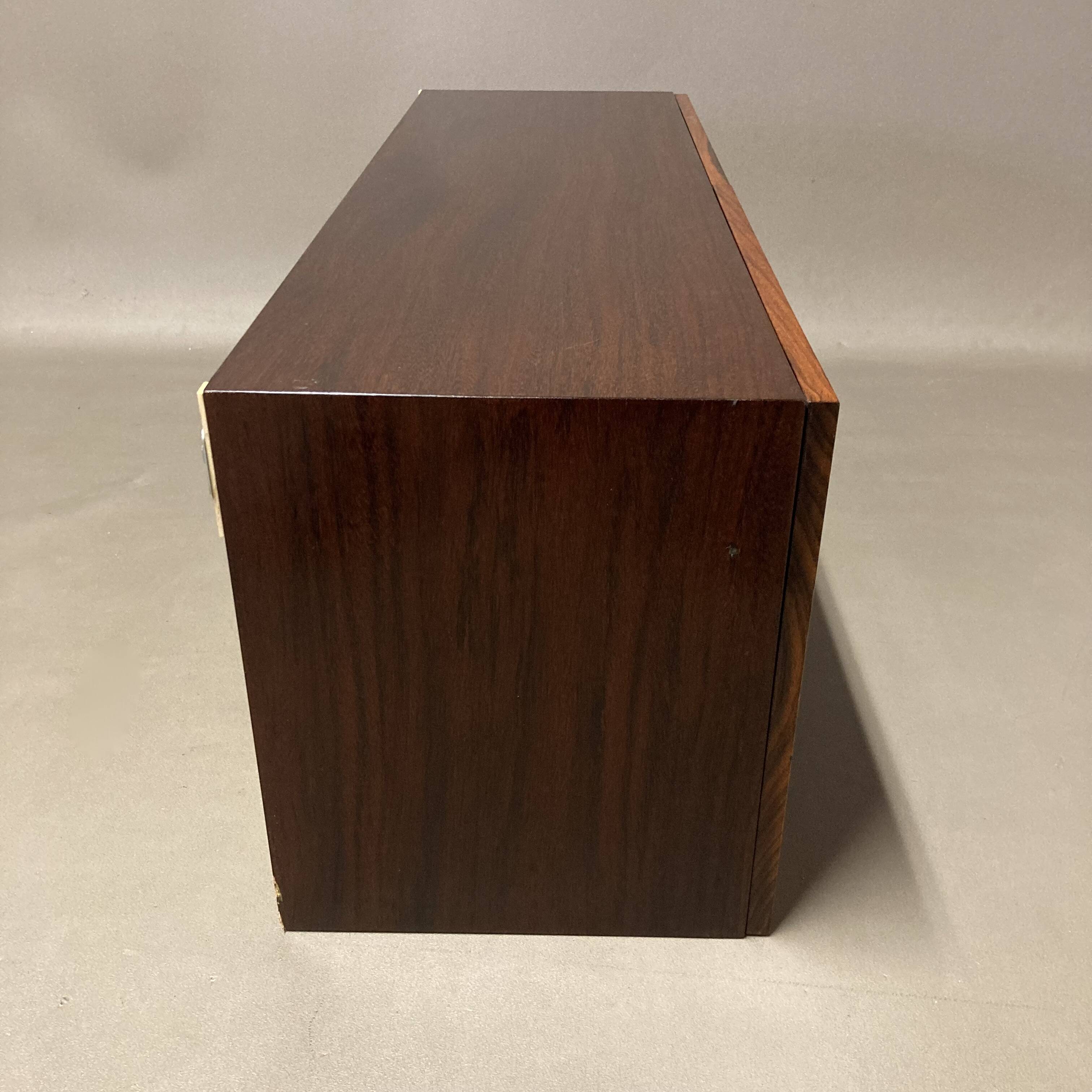 Scandinavian design rosewood hanging storage.