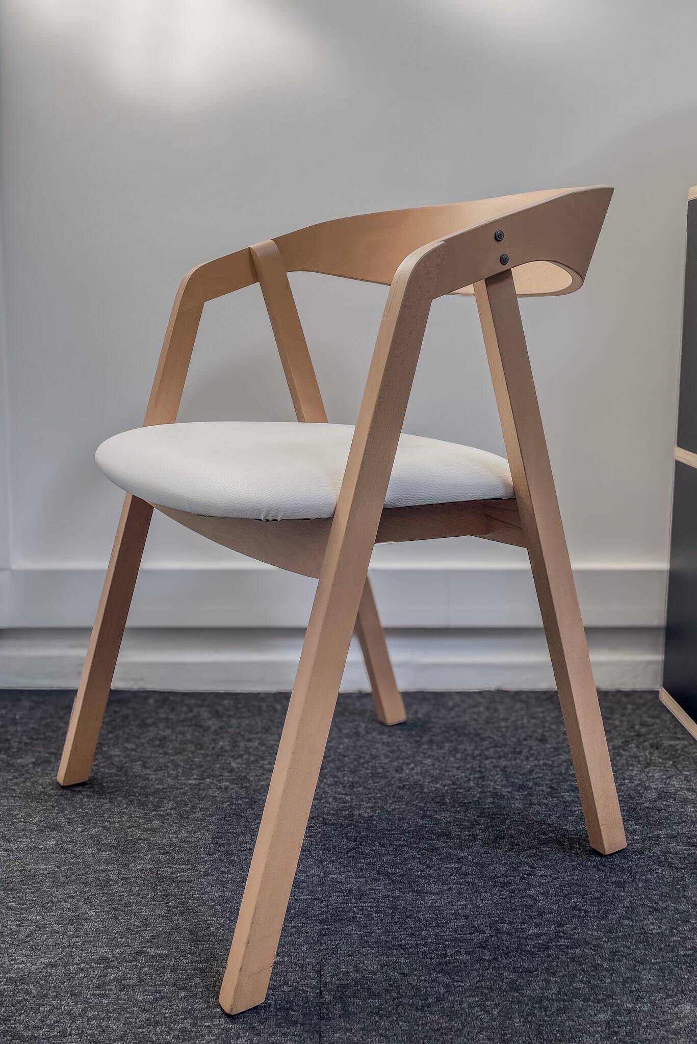 Professional chairs in beech and coated white textile