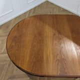 Round and extendable dining table published by G-Plan