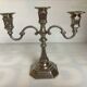 Large silver-plated metal three-light candlestick