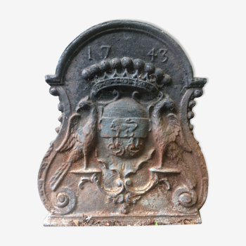 18th-century cast iron chimney plate - crowned lion coat of arms and birds