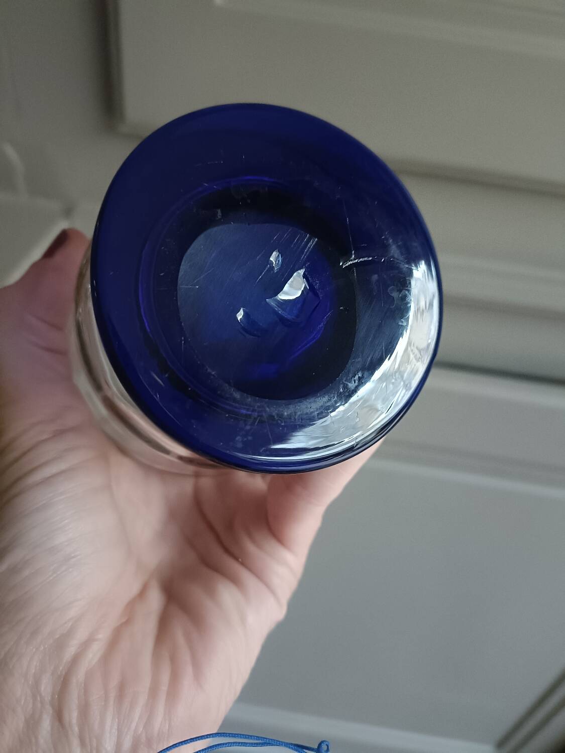 White and blue blown glass carafe