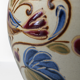 Vintage ceramic vase with bird decoration, signed.