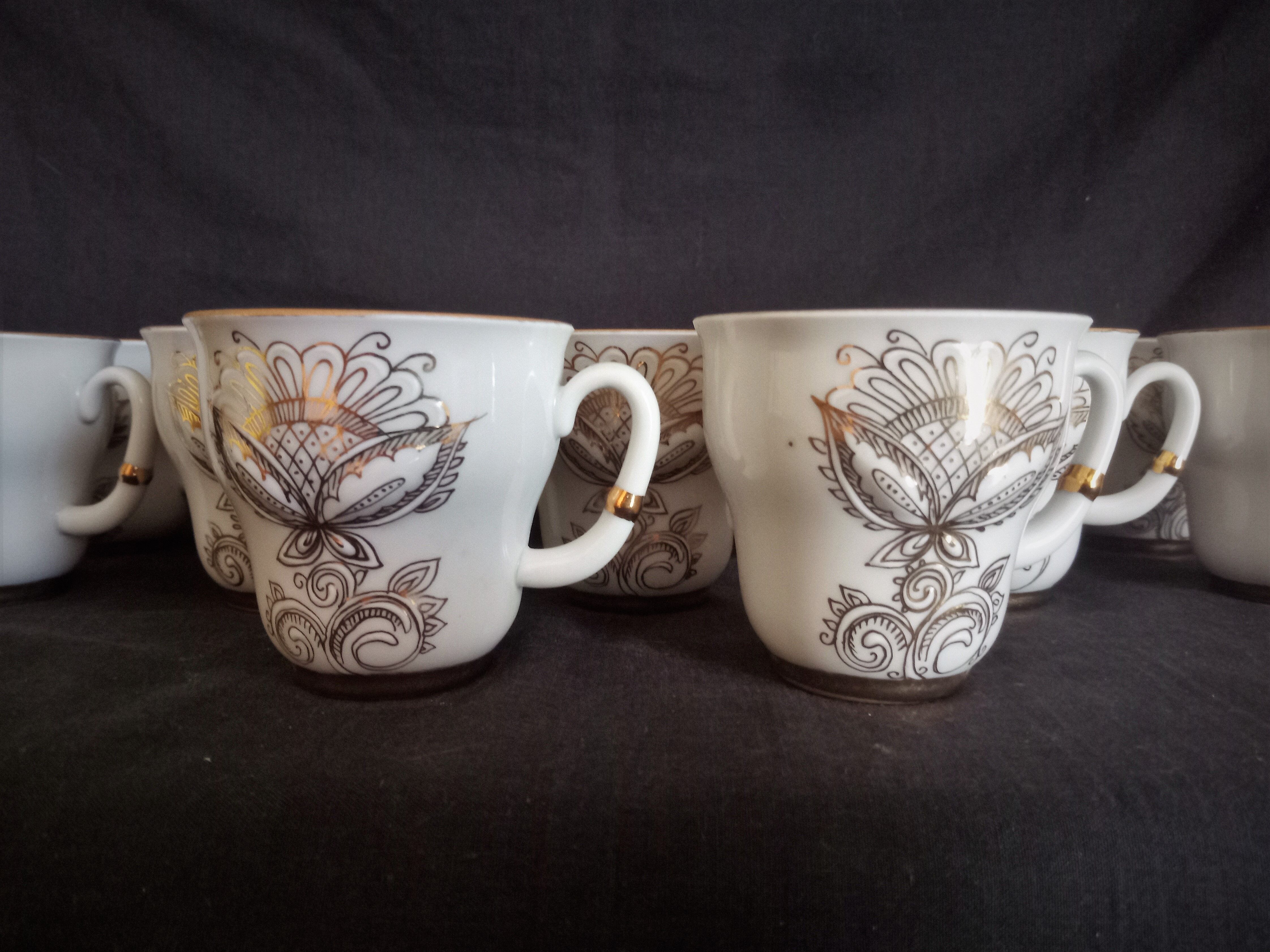 Lomonosov 29-piece porcelain coffee set, cast patterns enhanced with 24k gold