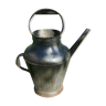 Old steel watering can