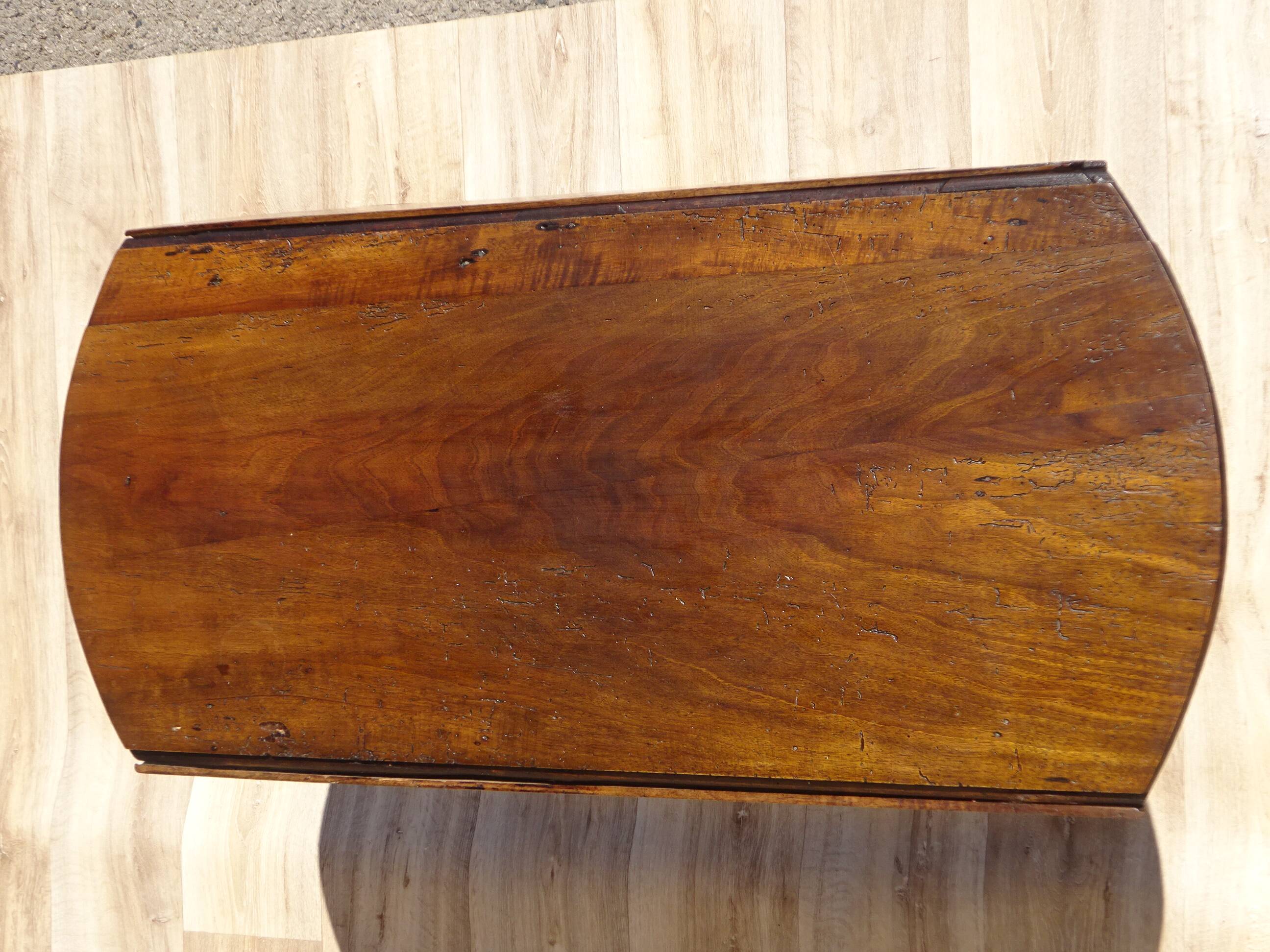 Antique walnut console table with honey spoon legs.