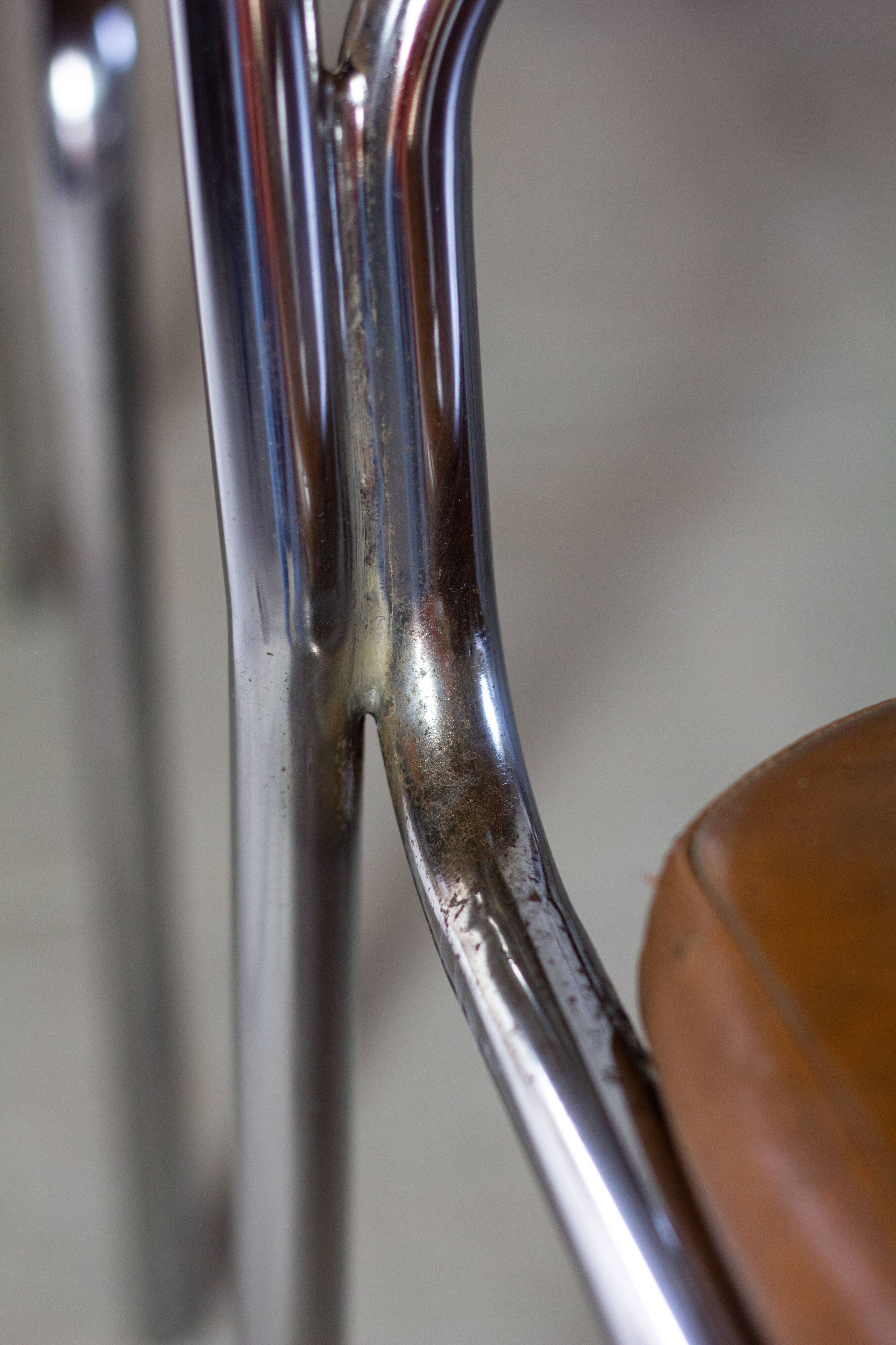 8 vintage tubular chrome and skai chairs, 1970