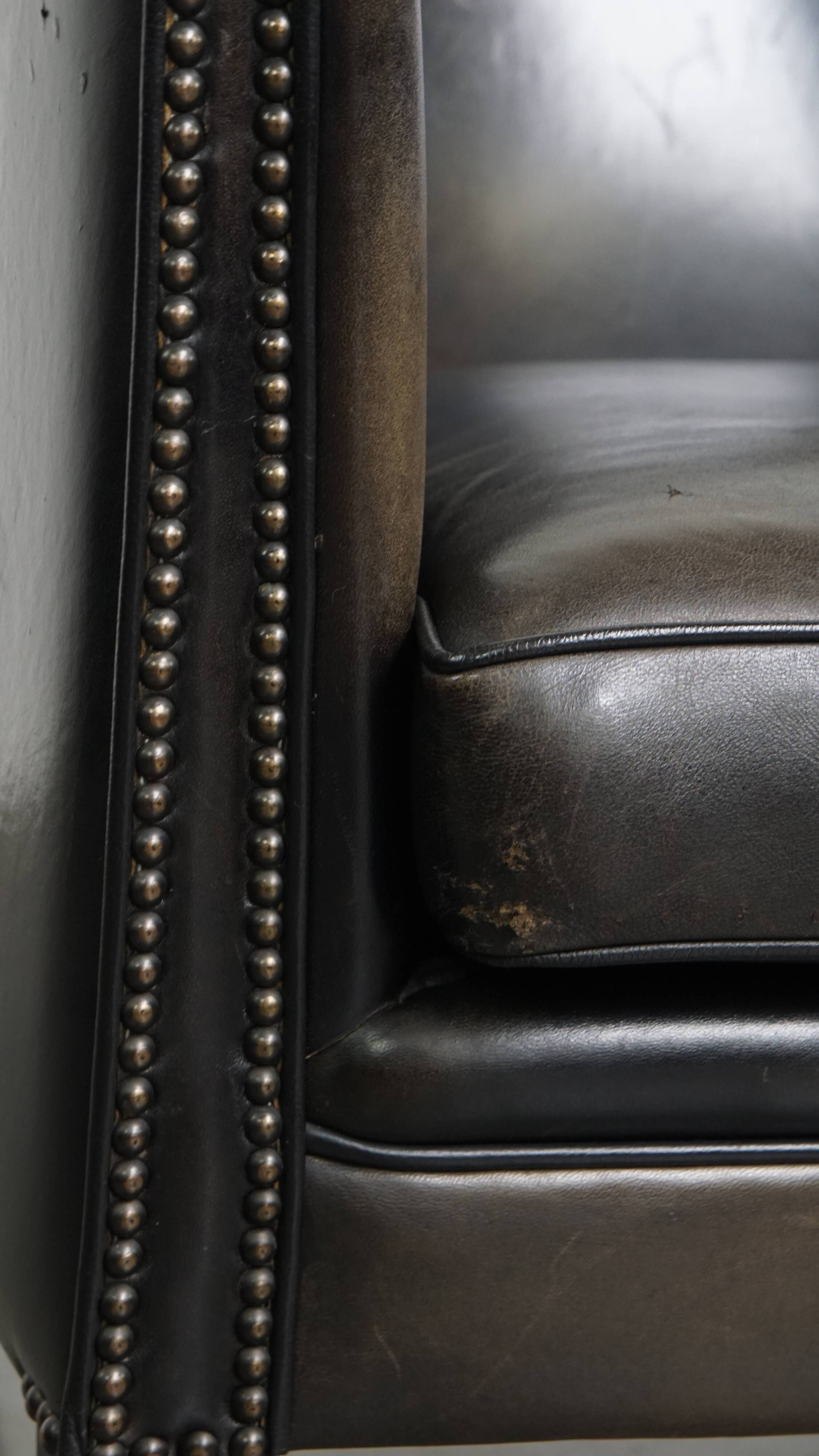 Set of 2  black/grey sheepskin leather club chairs