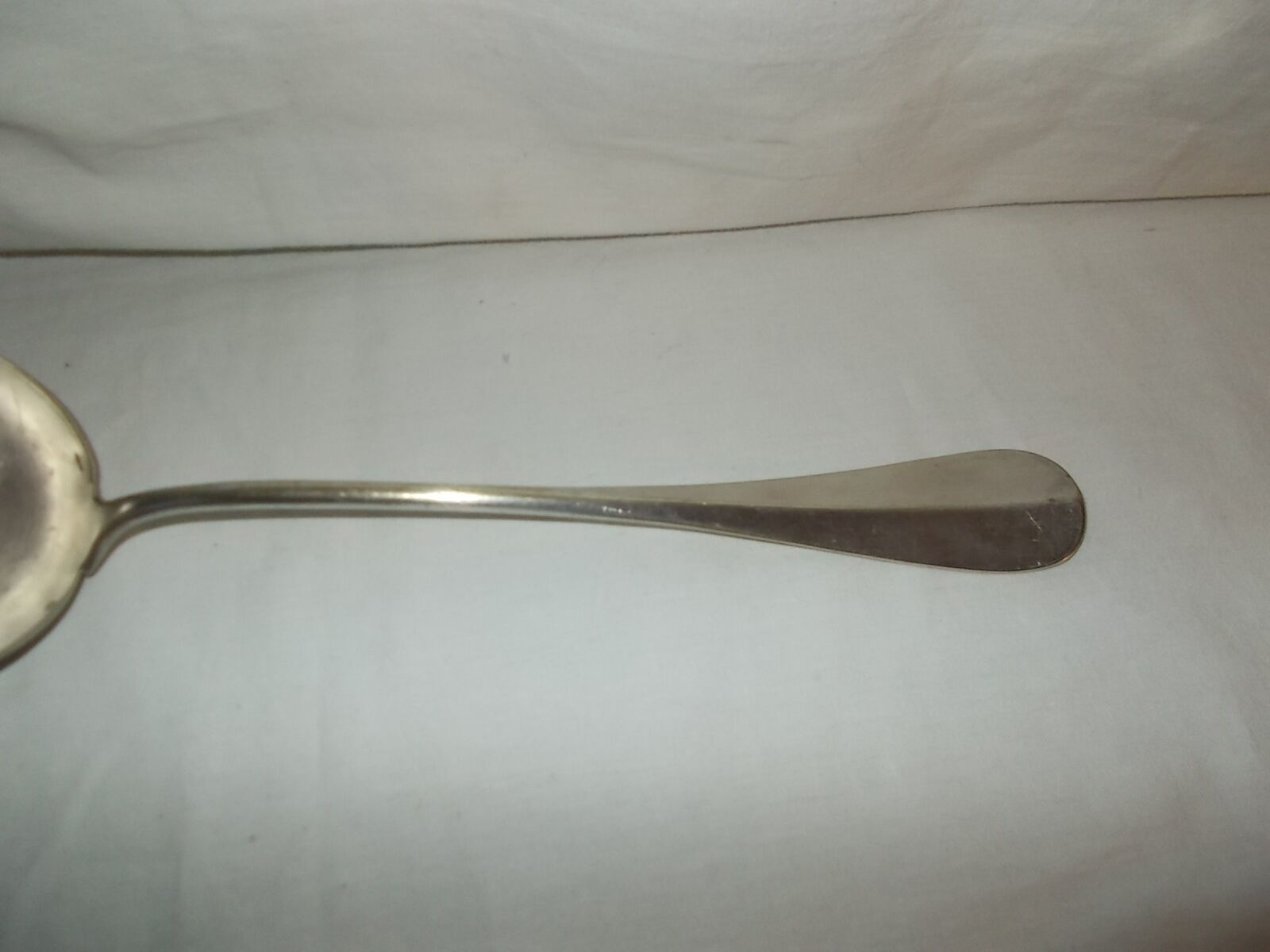 Silver metal ladle