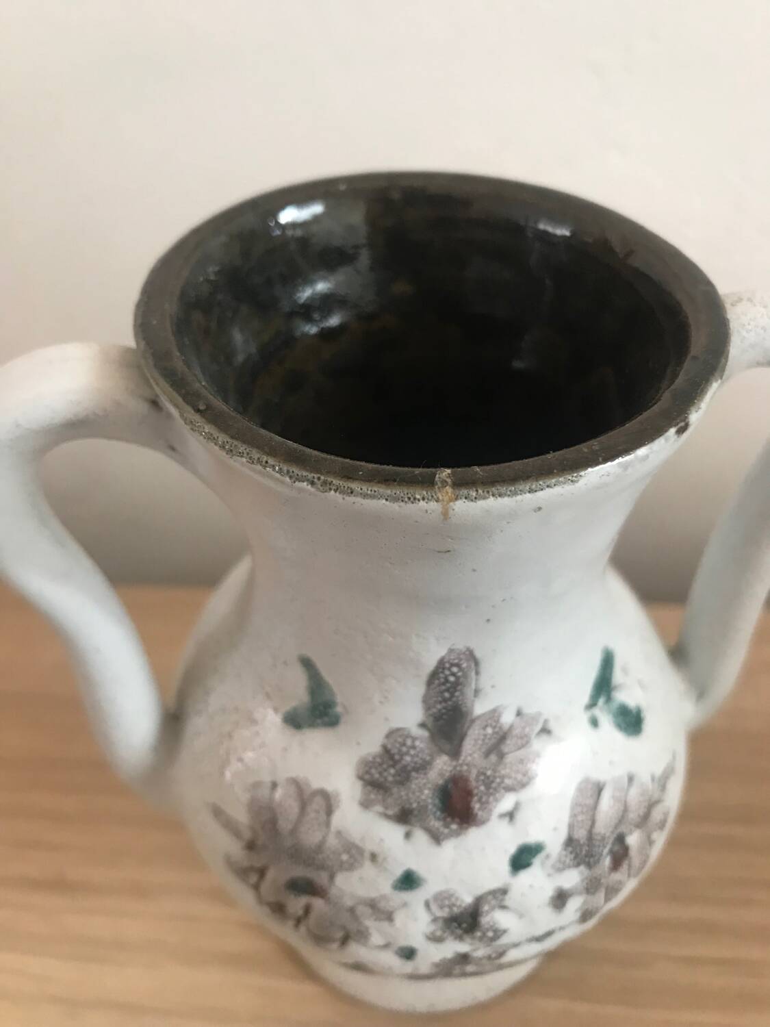 Small stoneware vase with handles and floral motifs Enameled In very good condition