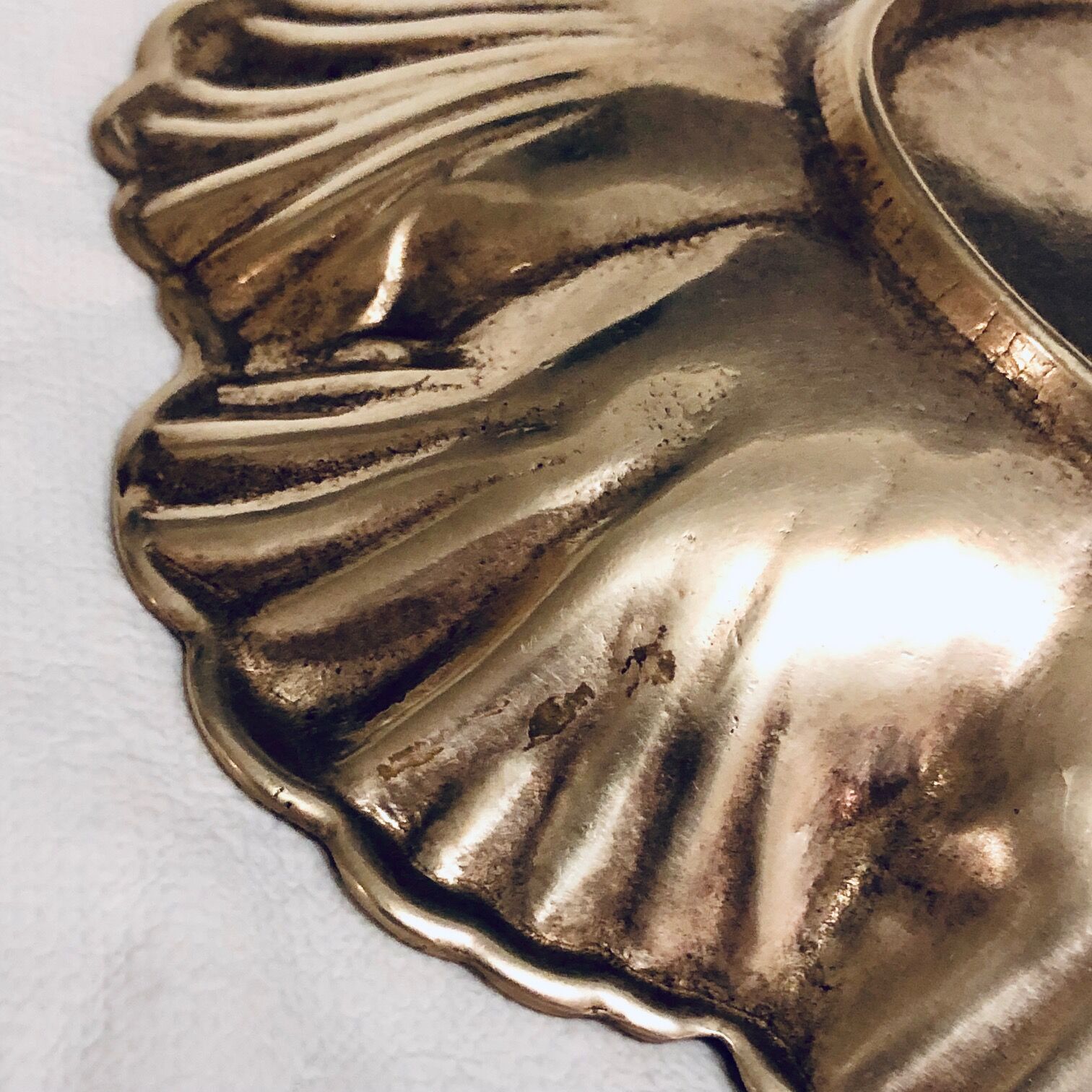 Empty oval brass pocket